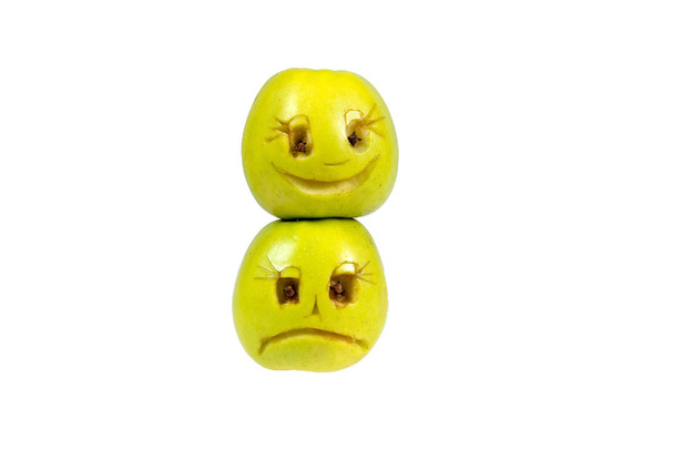 Щасливі і сумні смайлики з яблук. Почуття, ставлення та емоції
 - Фото, зображення