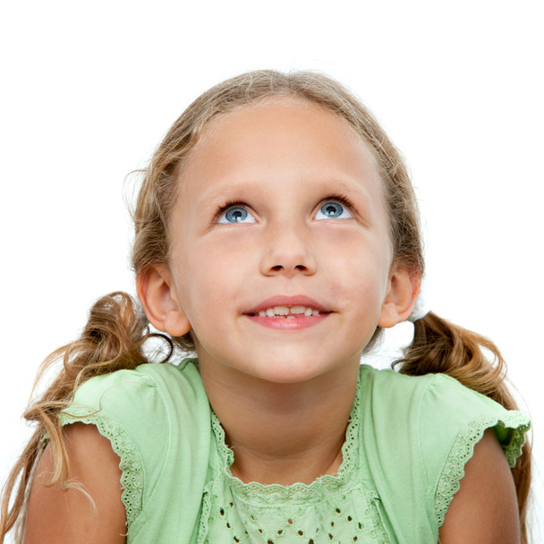 Close up portrait of cute girl looking up. - Foto, Imagen