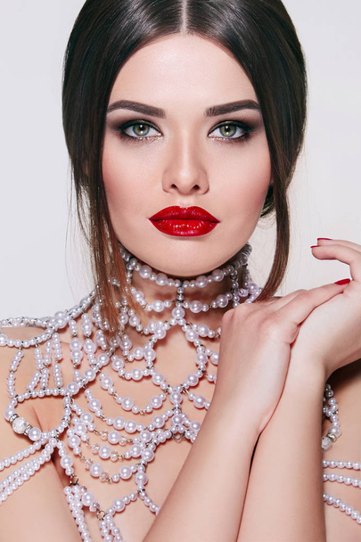 Beautiful stylish girl with necklace precious stones - Fotografie, Obrázek