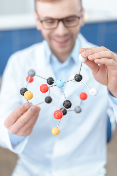Scientist with molecular model - Photo, Image