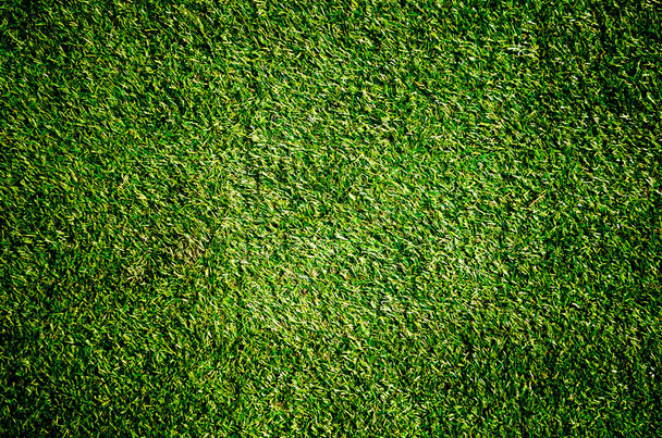 groen gras voetbalveld achtergrond - Foto, afbeelding