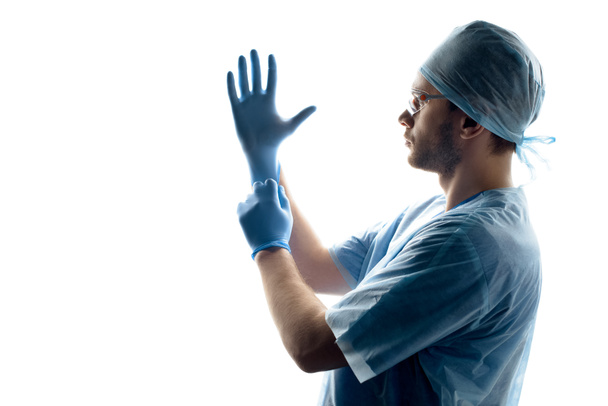 Chirurgien portant des gants
 - Photo, image