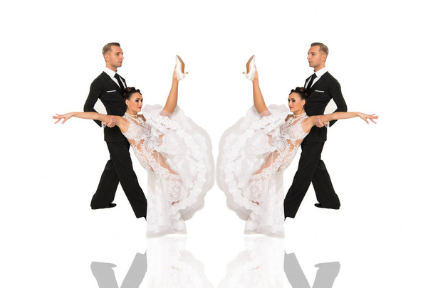 ballrom dance couple in a dance pose isolated on white bachground - Foto, afbeelding