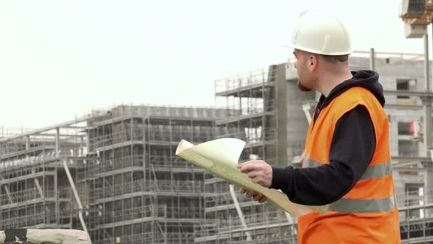 engineer at the construction site - Video, Çekim