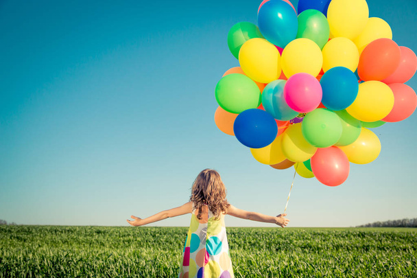 child playing with balloons outdoor - Foto, Imagem