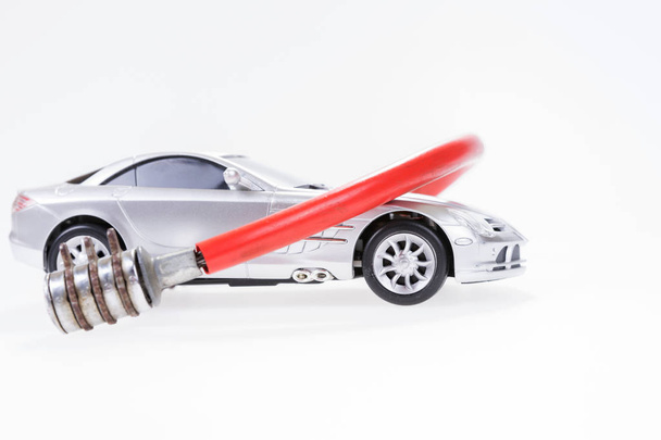 Silver sports car secured with lock - Photo, Image