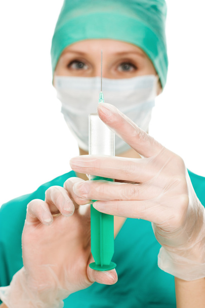 Surgeon woman with syringe making injection, - Zdjęcie, obraz
