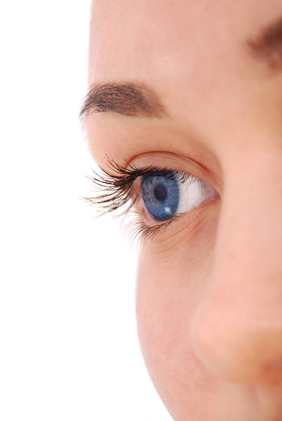 Close-up view of female blue eye - Fotó, kép