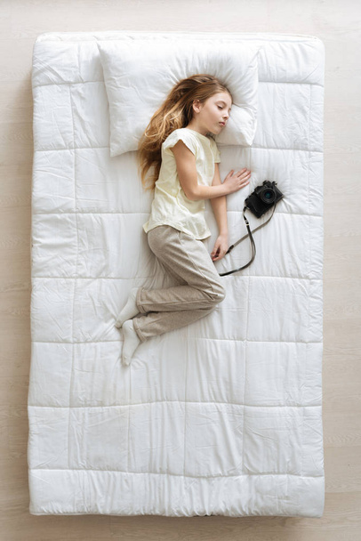 Serene sweet child dreaming about her hobby - Valokuva, kuva