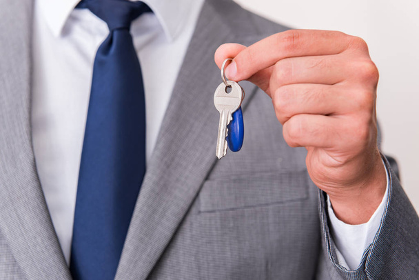 Businessman in real estate concept with home key - Фото, зображення
