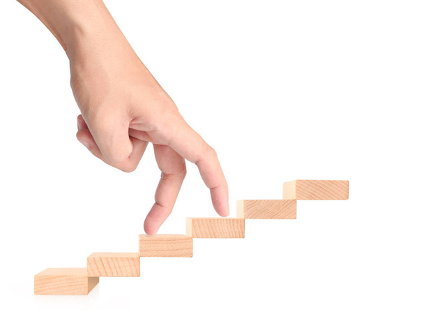 Käsi samankaltainen liiketoiminnan henkilö tehostamalla lelu portaikko
 - Valokuva, kuva