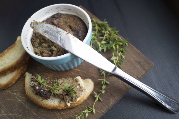 liver pate with toast on a round Board - Photo, Image