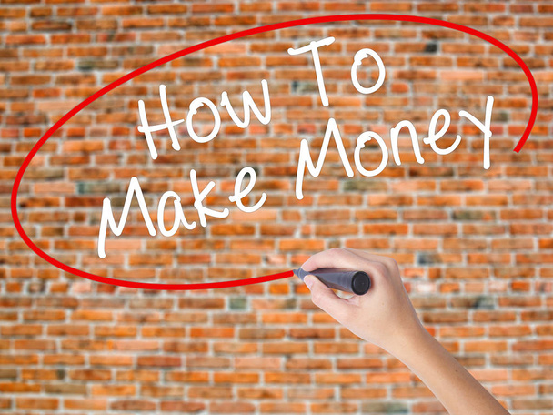 Woman Hand Writing How To Make Money with black marker on visual - Foto, Bild