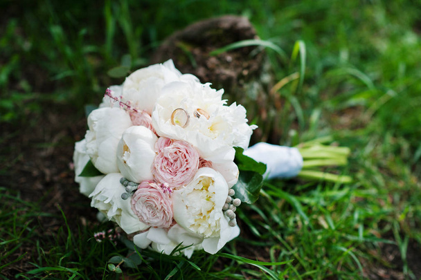 Elegance wedding bouquet of white and rose peonies with wedding  - Fotó, kép