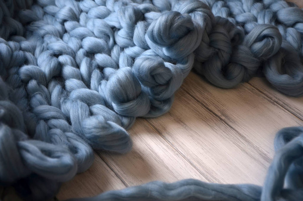 Gros plan de couverture tricotée, fond en laine mérinos
 - Photo, image
