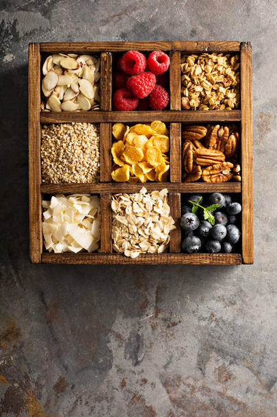 Breakfast foods in a wooden box overhead shot - 写真・画像