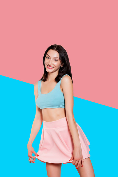 Sexy glamorous girl in pink skirt and turquoise top - Foto, imagen