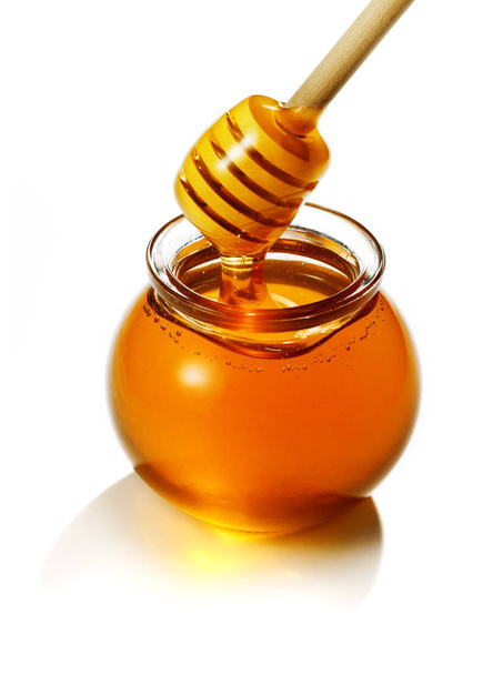 tarro de miel con palo de miel
 - Foto, Imagen