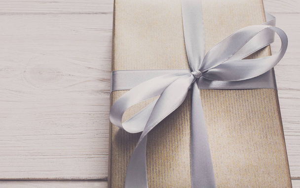 Gift wrapping. Modern holiday present in box - Photo, Image