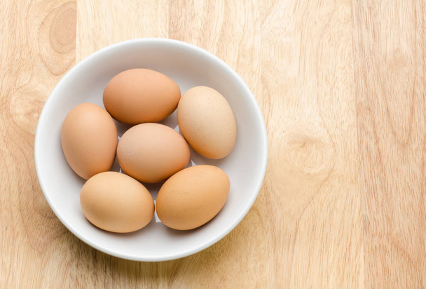 Fresh eggs in a bowl  - Fotó, kép