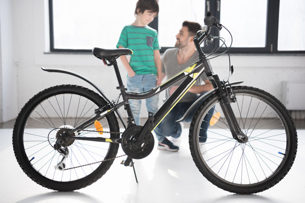 Father and son with bicycle - Photo, Image