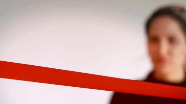 Shot of Confidant business woman cutting red ribbon - Footage, Video