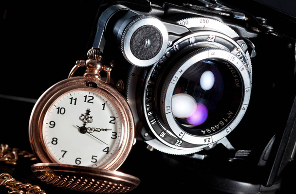 Retro camera and pocket watch - Фото, изображение