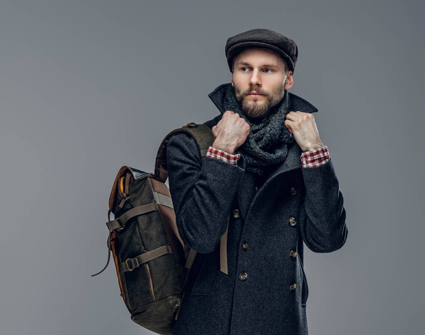 Bearded man holds a backpack - Photo, Image