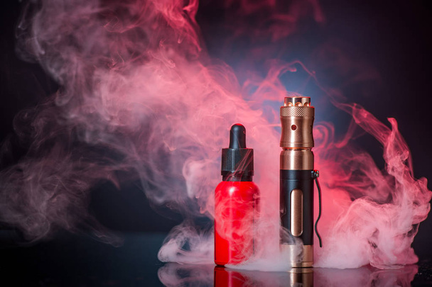 Electronic Cigarette on a black background in the studio - Foto, Imagen