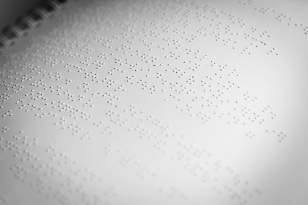page of braille alphabet in white paper. - Foto, Imagen
