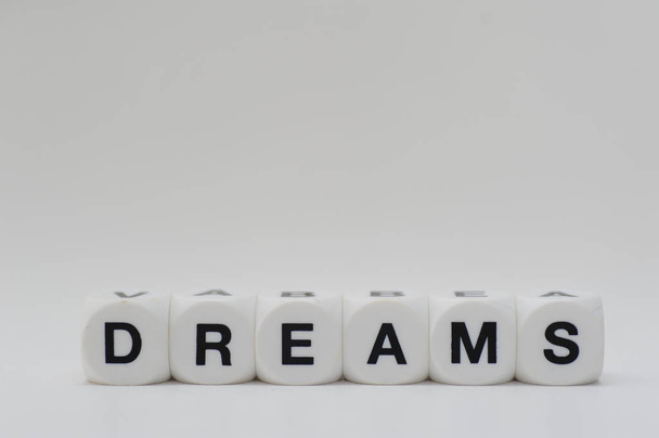 dreams dice letters - Foto, afbeelding
