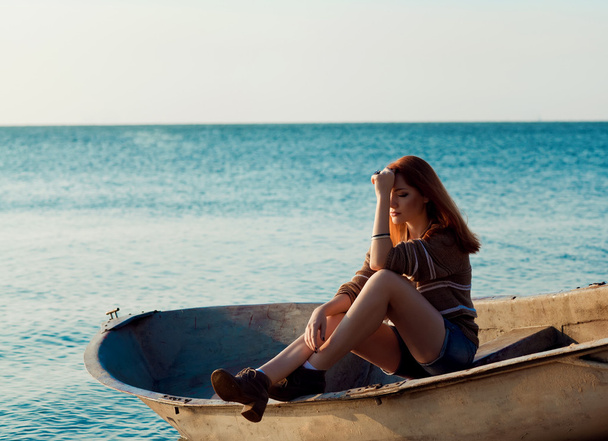 Beautiful sexy woman in a boat - Foto, Imagem