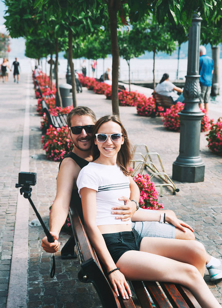 Smiling couple making selfie photo in Gargnano at Lake Garda, It - Zdjęcie, obraz
