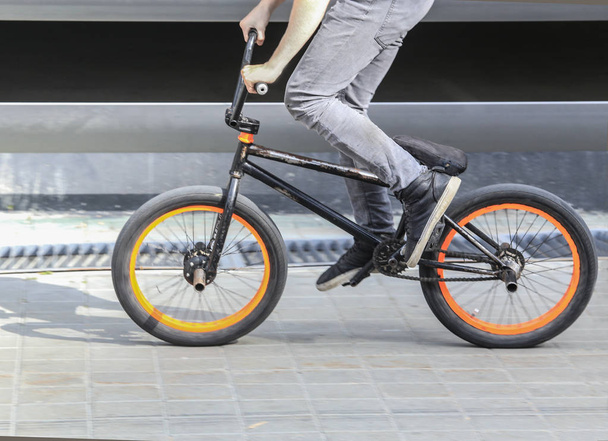 cyclist jump on bicycle - Fotó, kép