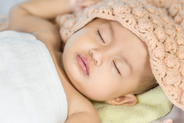 Baby sleeping on bed in the bedroom - Photo, Image