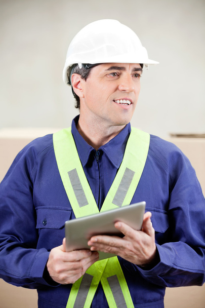Foreman With Digital Tablet Standing in Warehouse - Фото, изображение