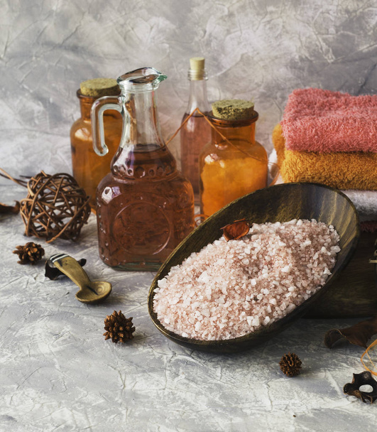 Set for spa with towels, salt and aromatic oils, selective focus - Foto, Imagem