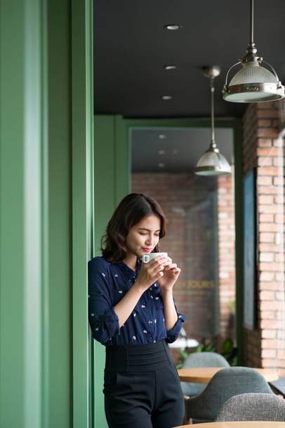 young business woman with mug - Photo, image