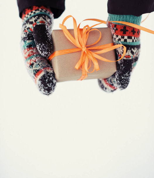 gift in hands in winter - 写真・画像