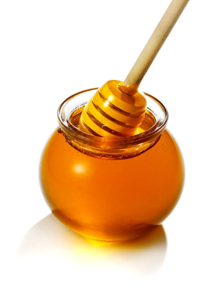 hunajapurkki hunajakepillä
 - Valokuva, kuva