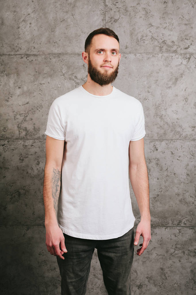 Man wearing white blank t-shirt with space for your logo - Photo, Image