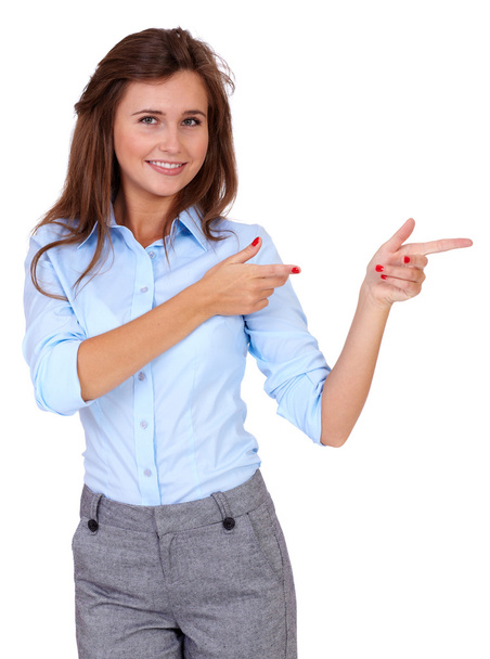 Young attractive businesswoman point to her side, isolated - Photo, Image