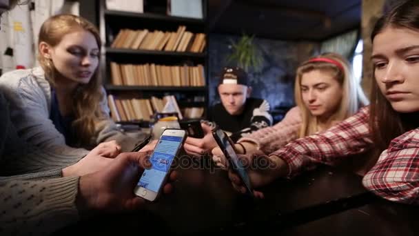 Best friends group surfing net with mobile phones - Footage, Video