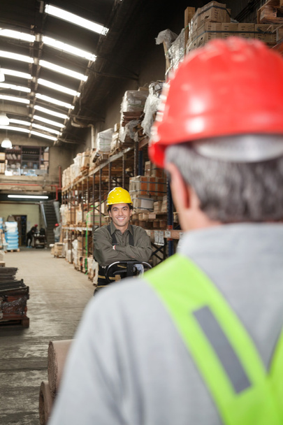 Foreman With Arms Crossed Standing At Warehouse - Photo, Image