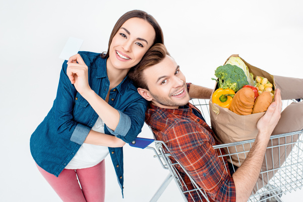 Couple with shopping cart - Photo, Image
