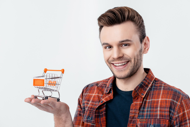 man bedrijf shopping cart model - Foto, afbeelding