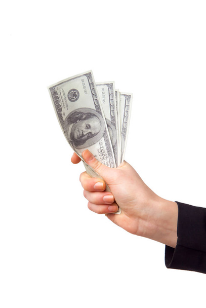 Hand with money isolated on a white background - Photo, Image