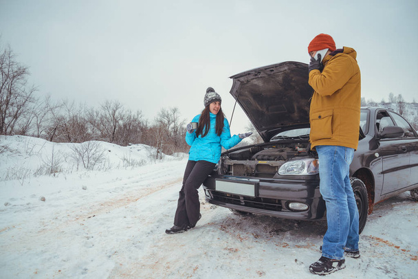 couple on the road with broken car - Photo, Image