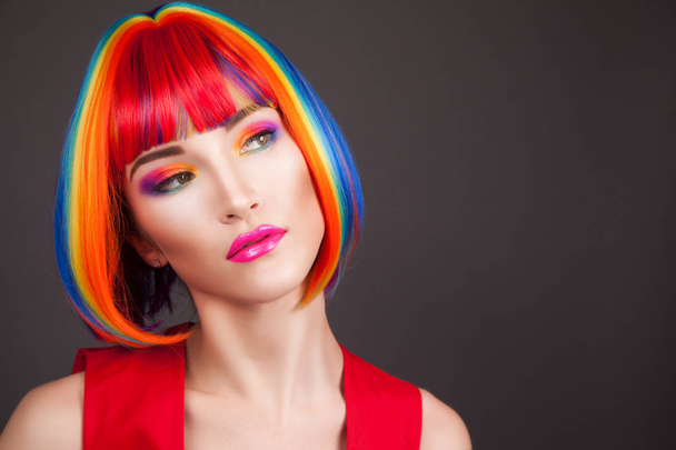 beautiful woman wearing colorful wig - Fotografie, Obrázek