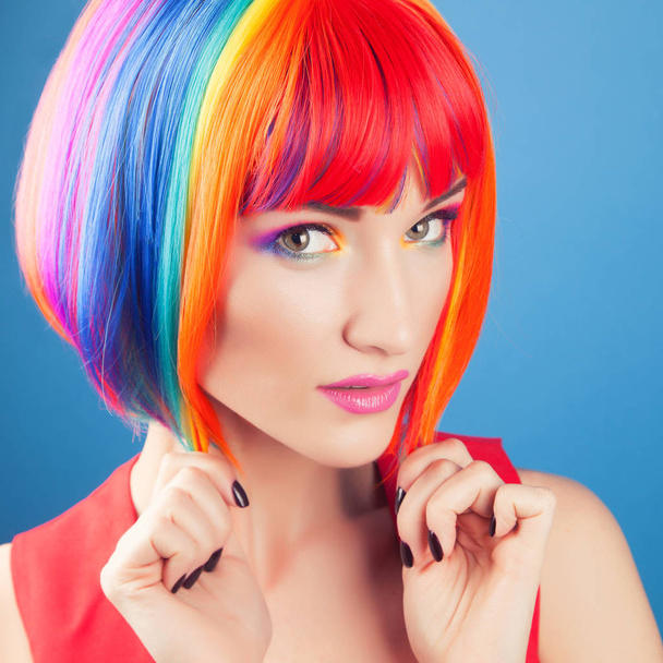 beautiful woman wearing colorful wig - Fotografie, Obrázek